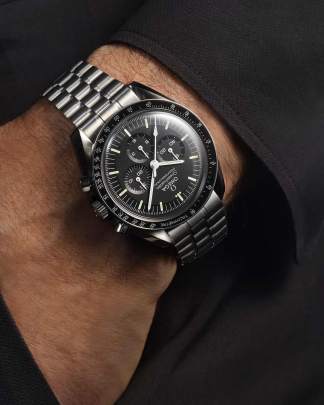 Omega Speedmaster Moonwatch Professional featuring a classic black step dial and a stainless steel bracelet Watch Omega